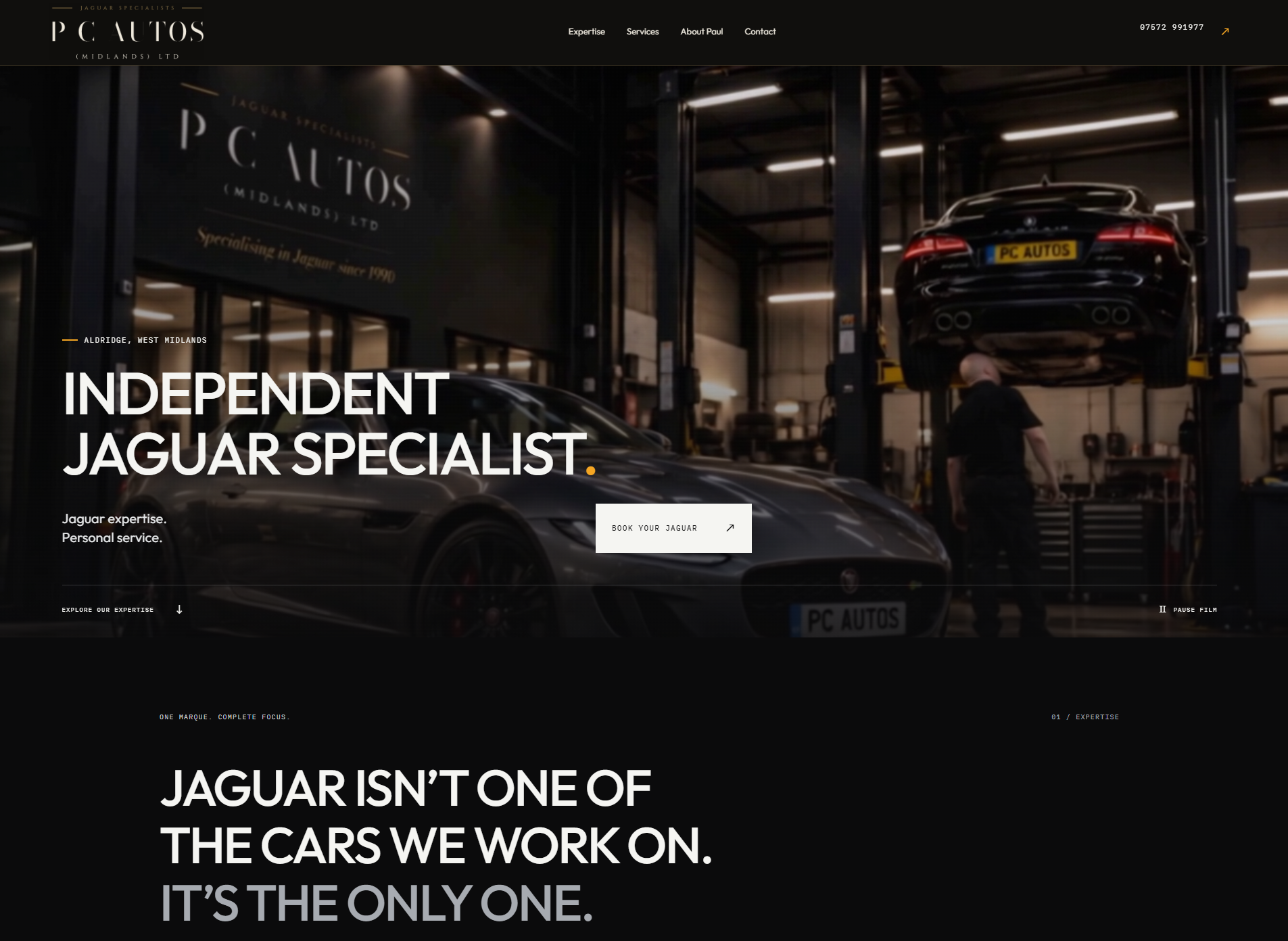 PC Autos homepage showing its dark Jaguar workshop design and independent Jaguar specialist headline